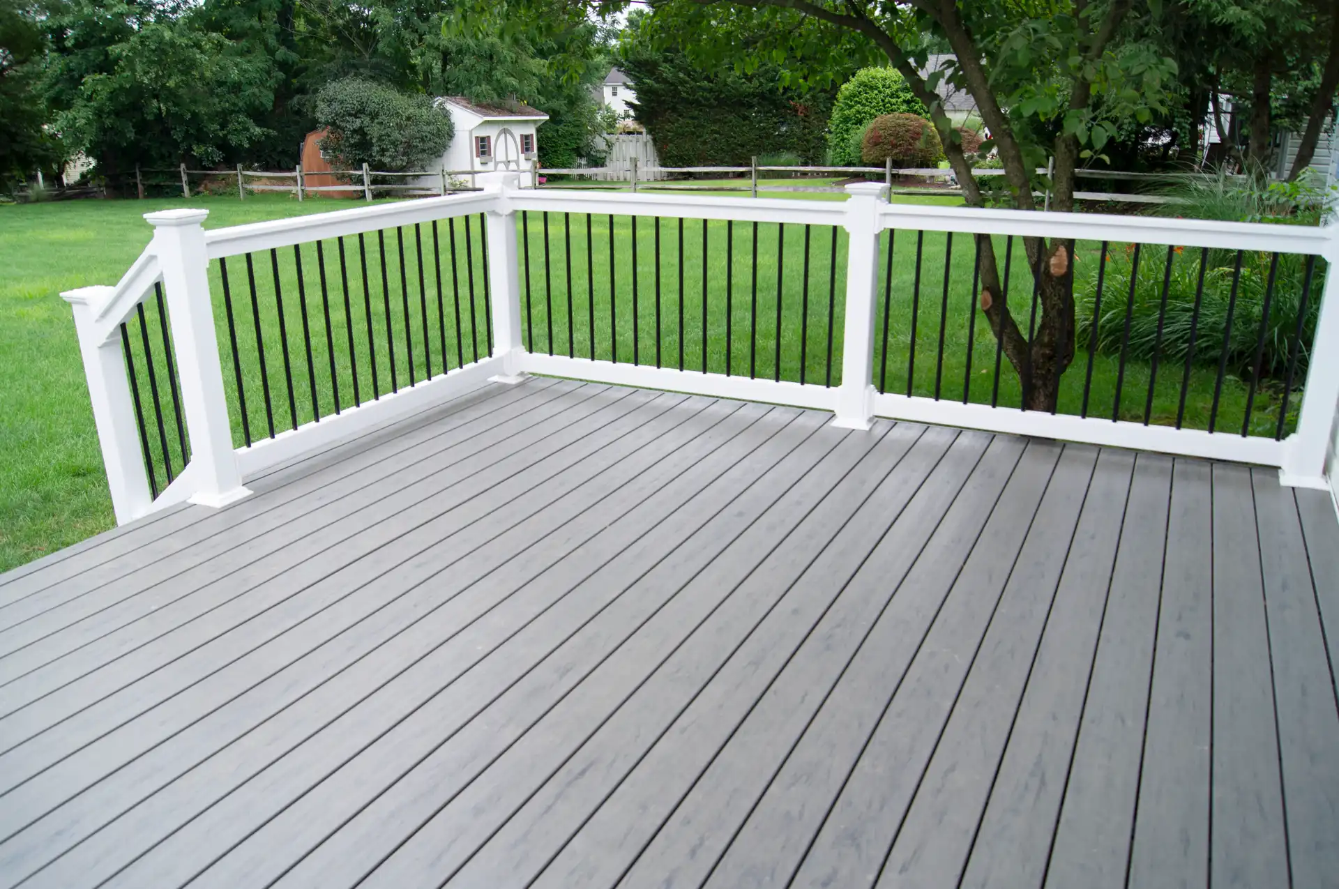 Gray Deck With Black and White Railing